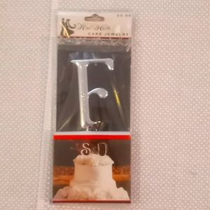 Initial "F" cake topper.